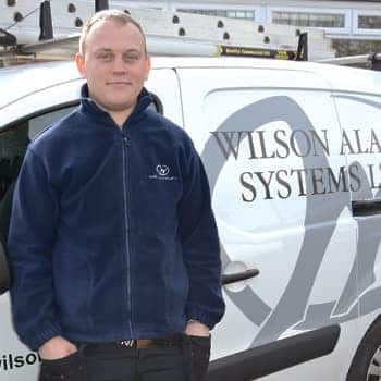 An image of a Wilson Alarm Systems Ltd employee names Krzysztof Kuchowicz