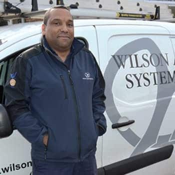 An image of a Wilson Alarm Systems employee named Leon Thomas