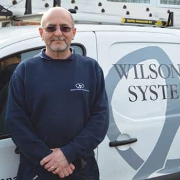An image of a Wilson Alarm Systems employee named Tim Pumfrett