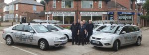 An image of Wilson Alarm Systems Ltd's team, premises and vehicles