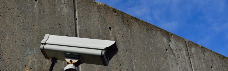 An image showing a security alarm attached to a wall.