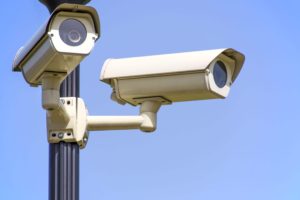 An image of CCTV camera systems with blue sky backround