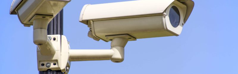 An image of CCTV camera systems with blue sky backround