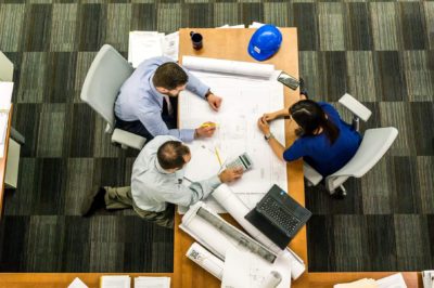 An image of employees working in a secure office.