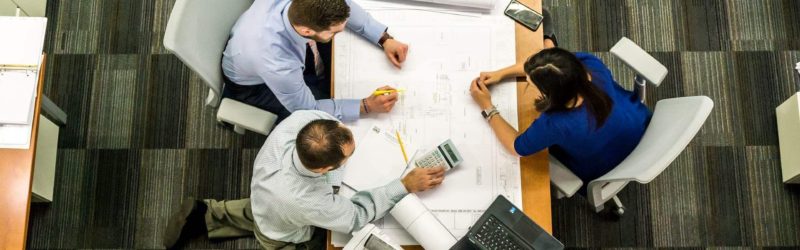 An image of employees working in a secure office.